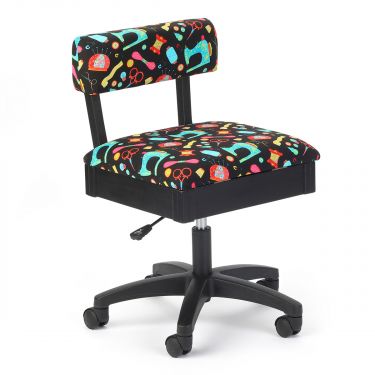 <strong>Hydraulic Sewing Chair with Underseat Storage</strong> <span>Black/Multicolour Notions Design/Black Wooden Base, Lumbar Support, Lift Mechanism, 5 Star, 360deg, Swivel Base on Casters. Sewing Room/Home Office</span> <em>Sewing Online HT2014</em>