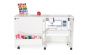 <strong>Compact Sewing Machine Cabinet</strong> <span>A White Sewing Machine Table with Lift Mechanism</span> <em>Sewing Online 101</em>