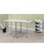 <strong>Quilting/Fabric Cutting Table</strong> <span>White Top with Silver Legs and Wheels, Folding Craft Table with Two Drop Leaves, Mobile, Compact and Easy to Store, Extra Workspace for Sewing, Craft/Hobby Projects</span> <em>Sewing Online 13371</em>